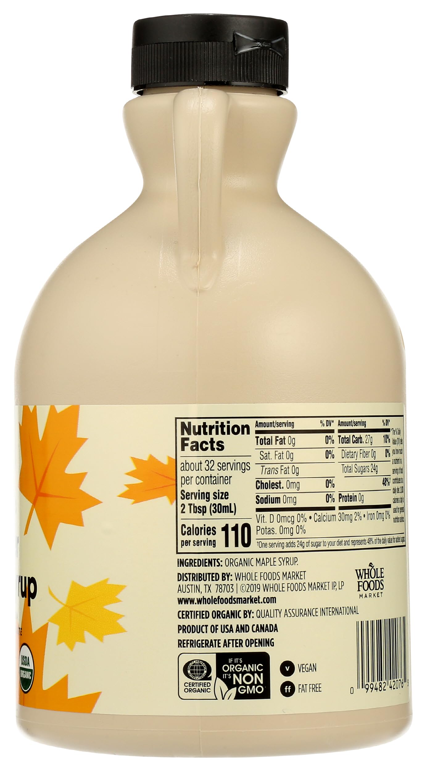 Glass bottle on counter showcases 32 oz size and convenient storage