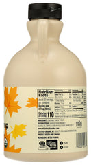 Glass bottle on counter showcases 32 oz size and convenient storage
