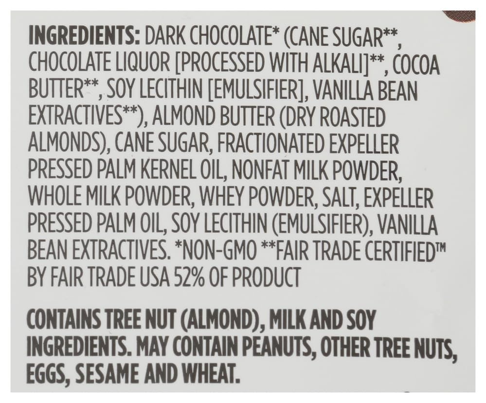 365 by Whole Foods Market mini dark chocolate almond butter cups bite highlighting almond butter.