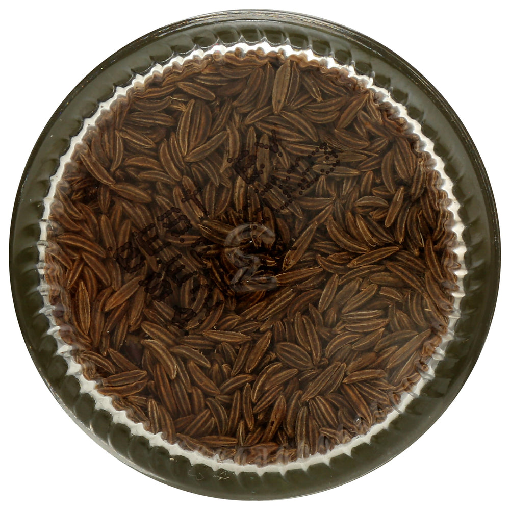 Caraway seeds on spice shelf with 365 by Whole Foods Market branding