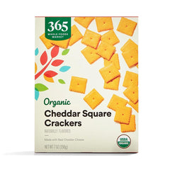 365 by Whole Foods Market Organic Cheddar Squares packaging shows a convenient 7-oz tray for on-the-go snacking.