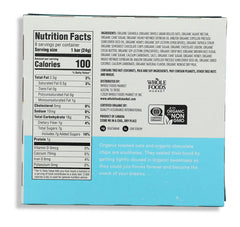 Close-up of chocolate chips in 365 by Whole Foods Market granola bars, chewy texture for quick snacks.