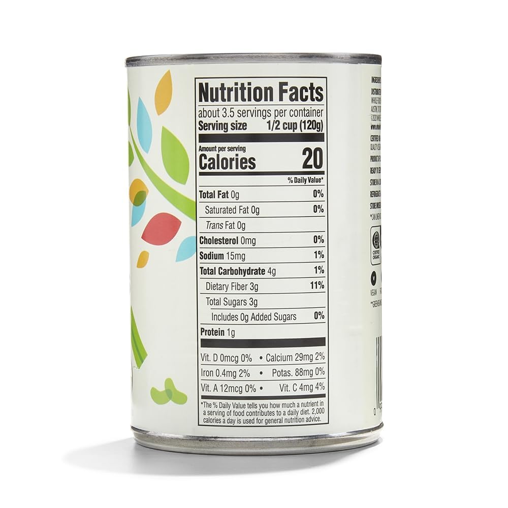 365 by Whole Foods Market label close-up on organic cut green beans, no salt added for healthy meals.