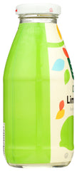 Side view of the lime juice bottle in a kitchen setup.