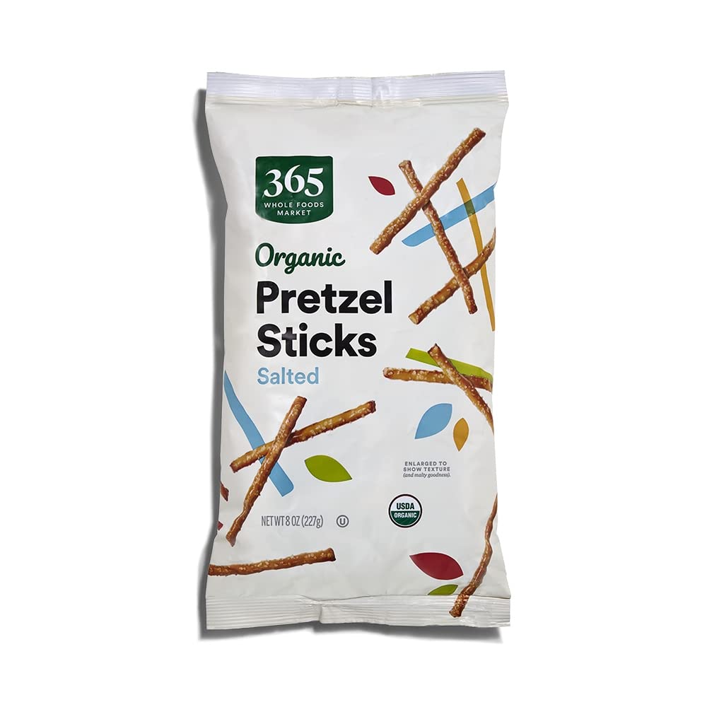 365 by Whole Foods Market Organic Mini Pretzel Sticks, open bag, ready for on-the-go snacking.