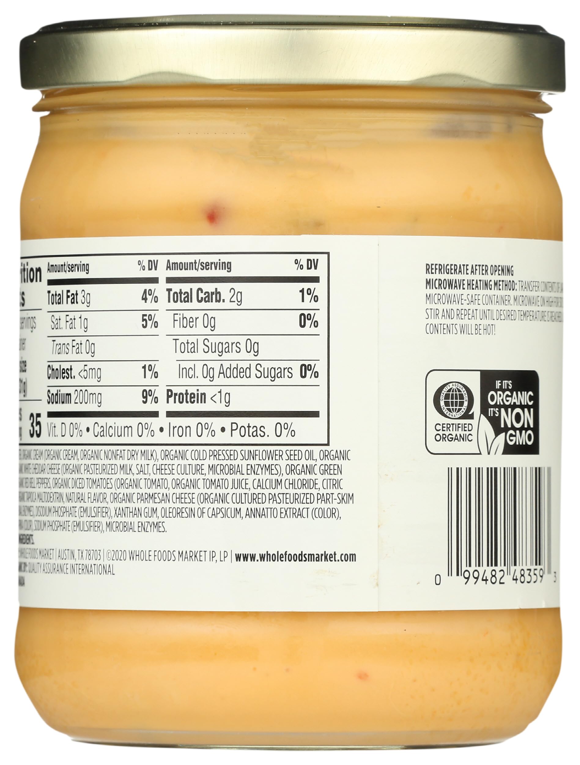 365 by Whole Foods Market Organic Salsa Con Queso 15oz pour shows a creamy, medium-heat flow.