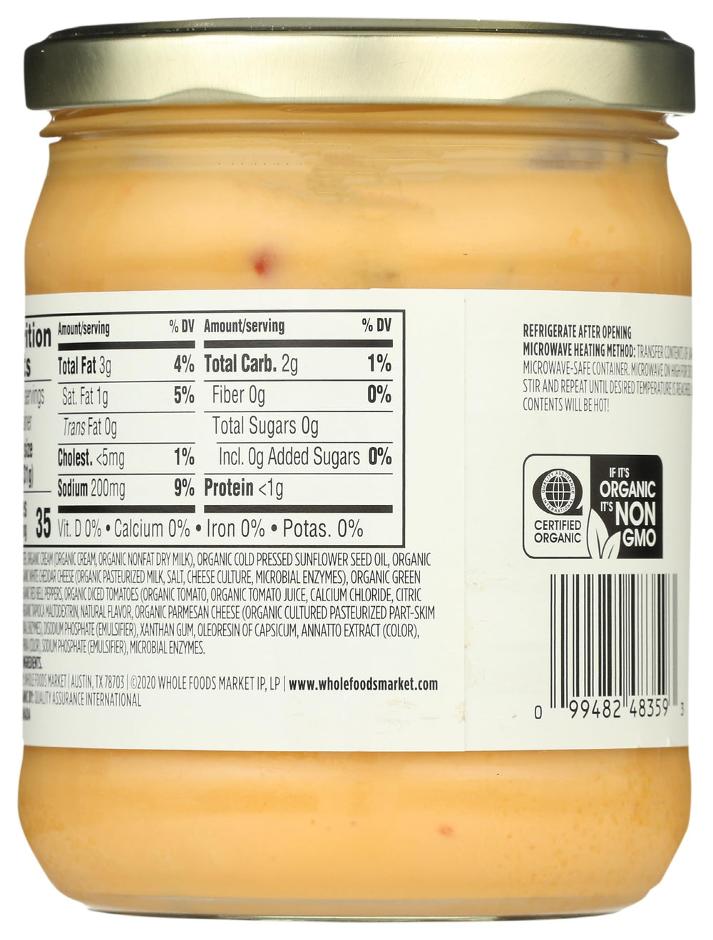 365 by Whole Foods Market Organic Salsa Con Queso 15oz pour shows a creamy, medium-heat flow.