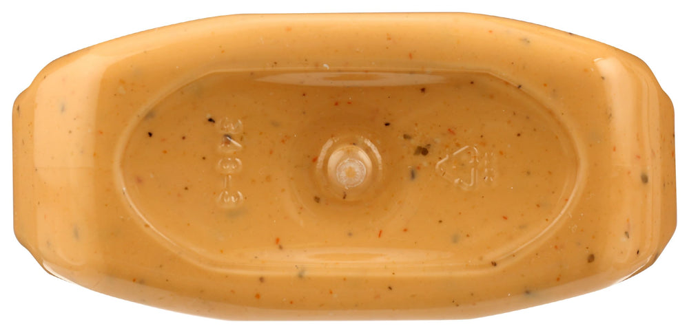 Dipping vegetables with 365 Ranch Dressing, showcasing versatility