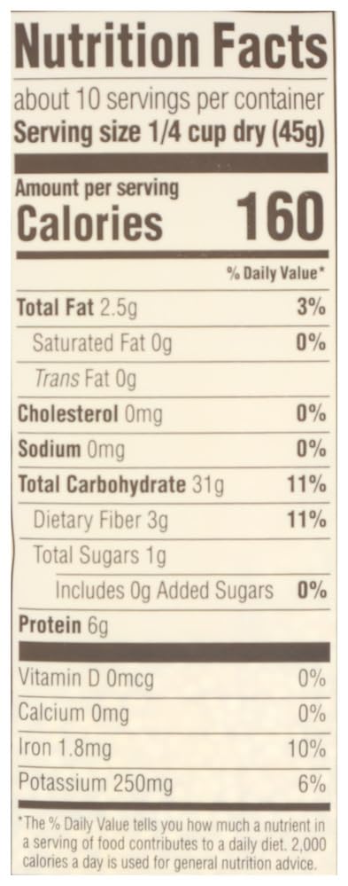 365 by Whole Foods Market organic white quinoa kitchen spoon aiding quick serving.