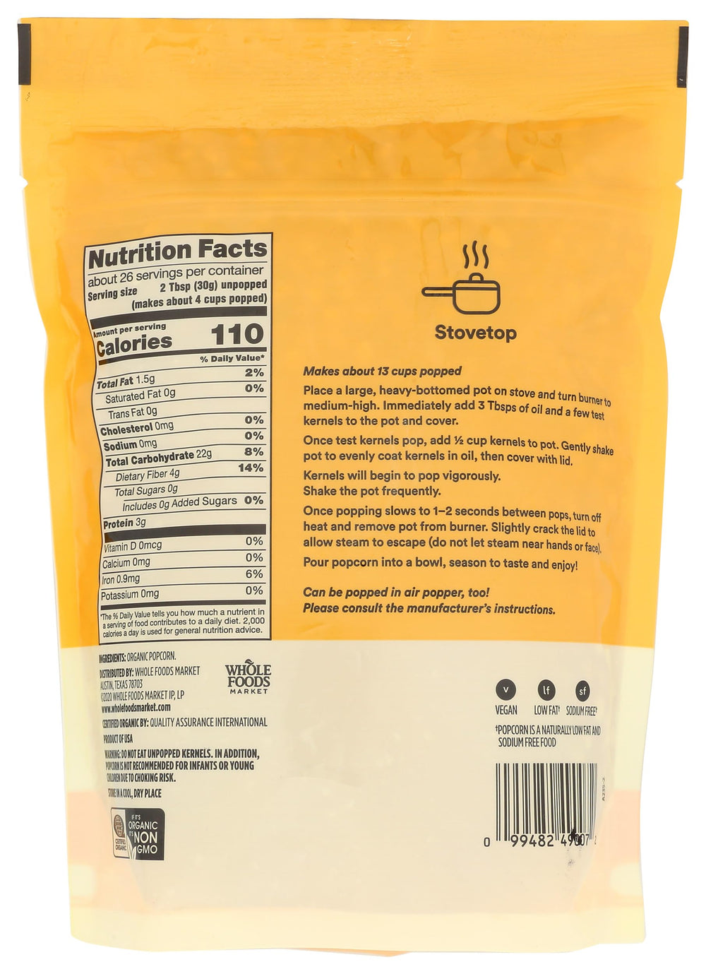 Close-up of 365 by Whole Foods Market organic yellow popcorn kernels, ready to pop.