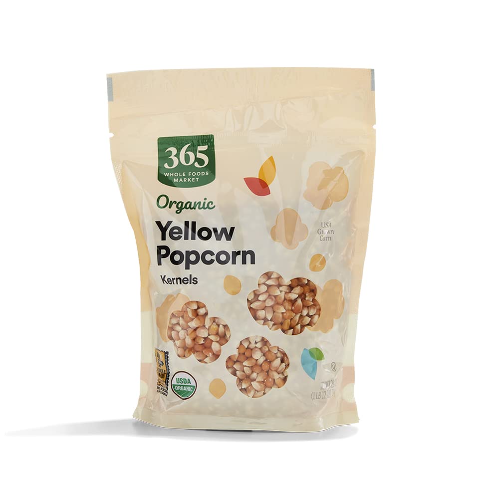 365 by Whole Foods Market organic yellow popcorn kernels in packaging, ideal for snacking.