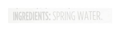 Pouring 365 spring water from BPA-free bottle for pure taste