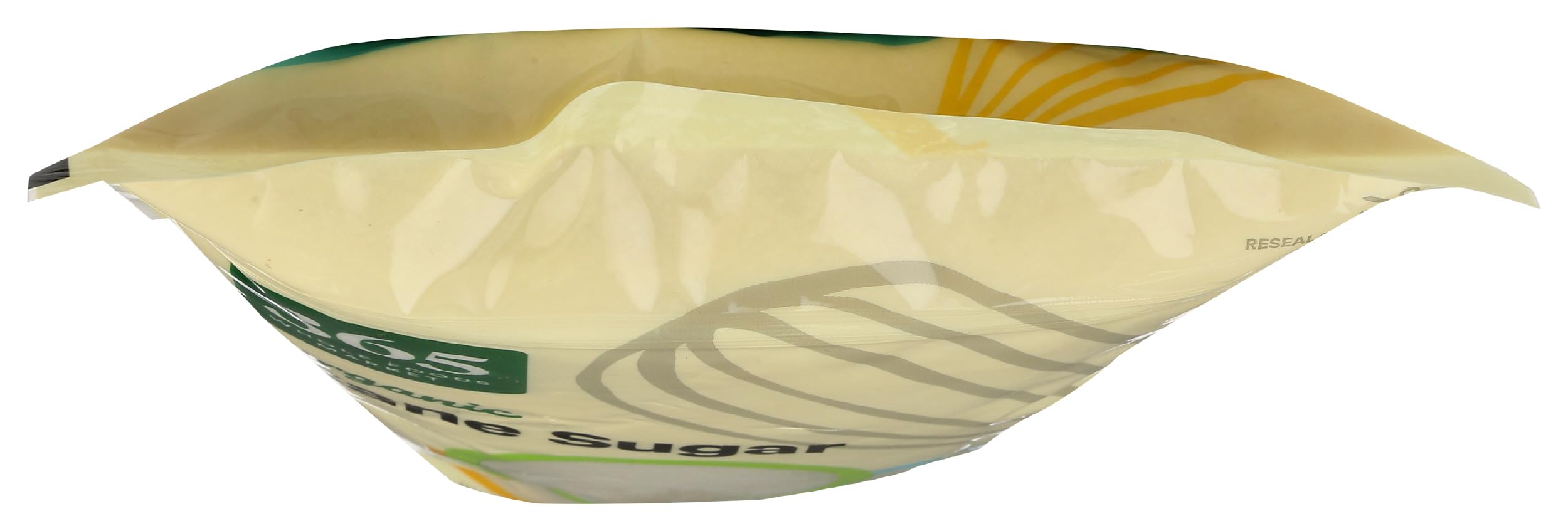 Measuring cup filled with 365 by Whole Foods Market Organic Cane Sugar for precise baking.