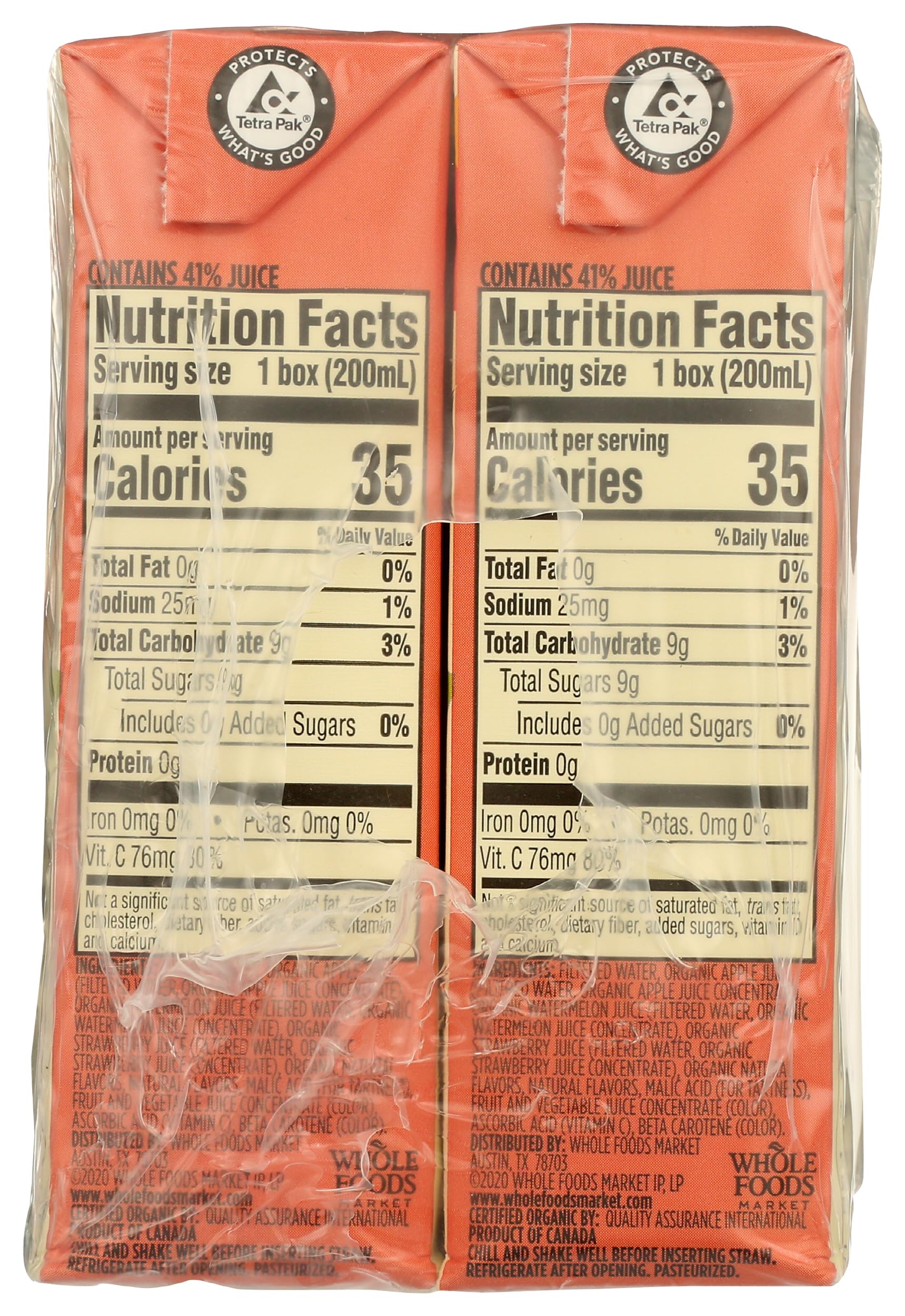 365 by Whole Foods Market organic reduced-sugar label closeup on juice box.