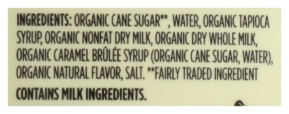 365 by Whole Foods Organic Salted Caramel Sauce being poured from glass bottle.