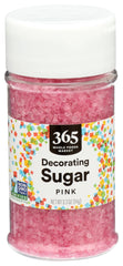 365 by Whole Foods Pink Decorating Sugar in a 3.3 oz jar adds festive sparkle to baked goods.