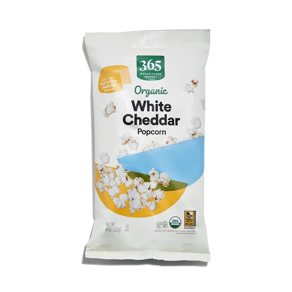 365 by Whole Foods Market white cheddar popcorn bag highlights real cheese for a savory, satisfying snack