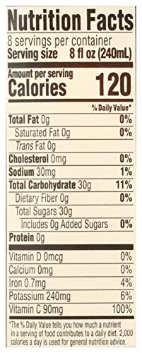 64 oz family-size bottle of 365 by Whole Foods Market juice on a kitchen counter.