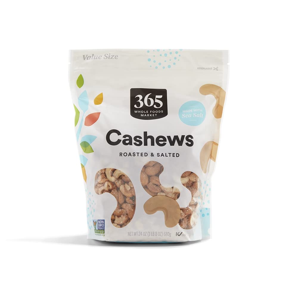 365 by Whole Foods Market roasted salted cashews closeup in 24oz bag, protein-friendly snack.