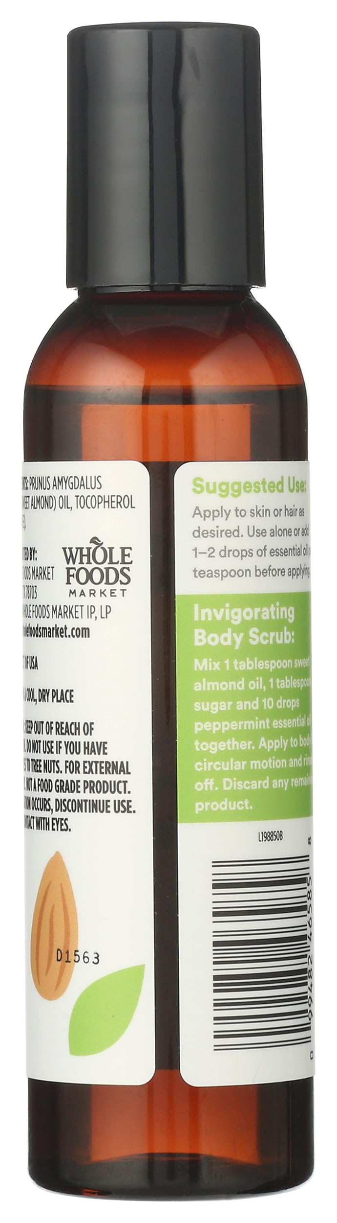 Close-up of 365 almond oil label showing natural ingredients and standards