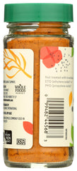 Closeup of 365 turmeric spice jar highlighting rich color and aroma.