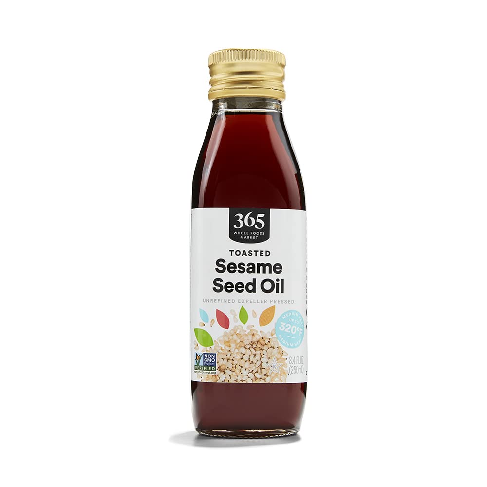 365 by Whole Foods Market toasted sesame oil bottle front highlighting premium flavor for cooking.