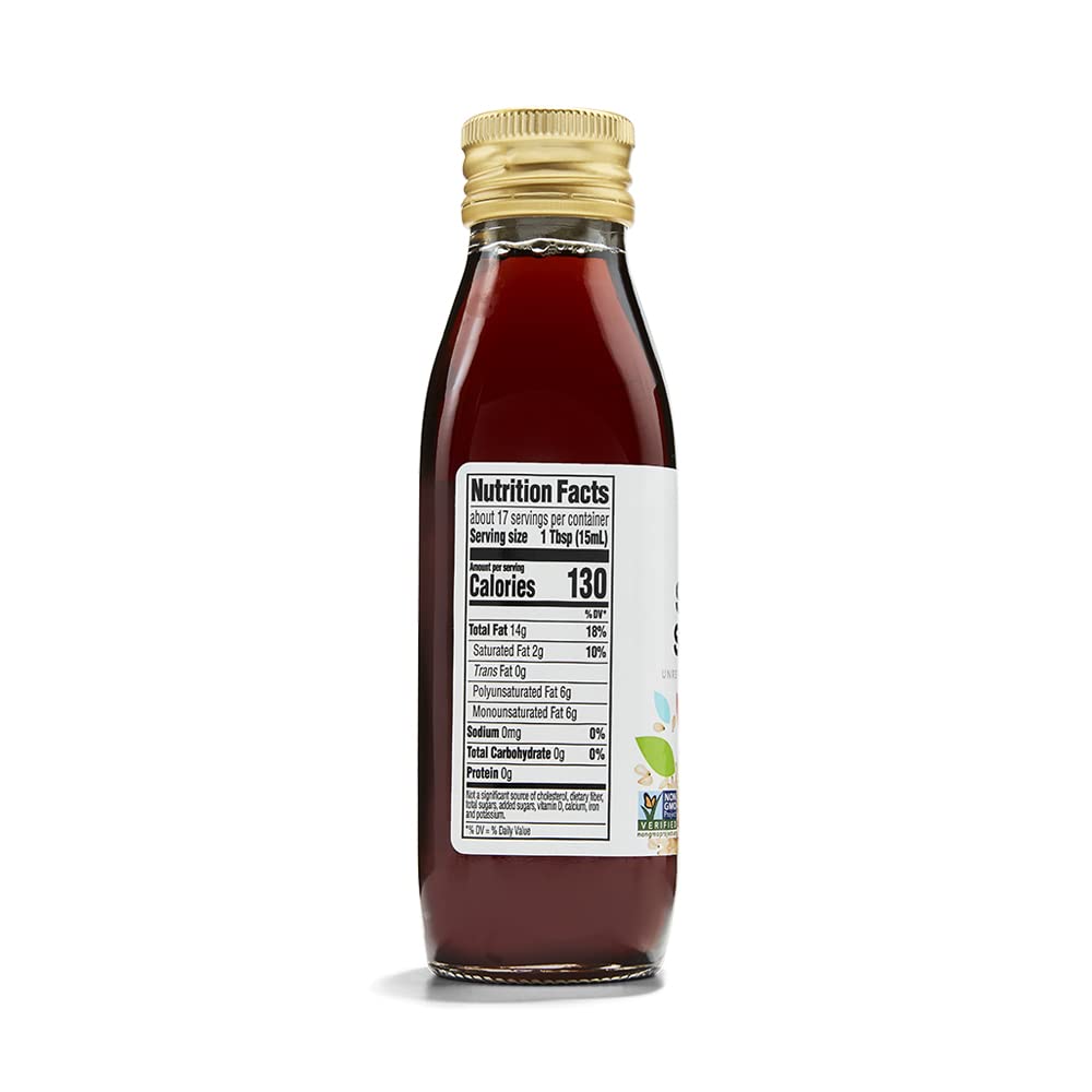 365 by Whole Foods Market toasted sesame oil pour scene emphasizes aromatic profile for cooking.