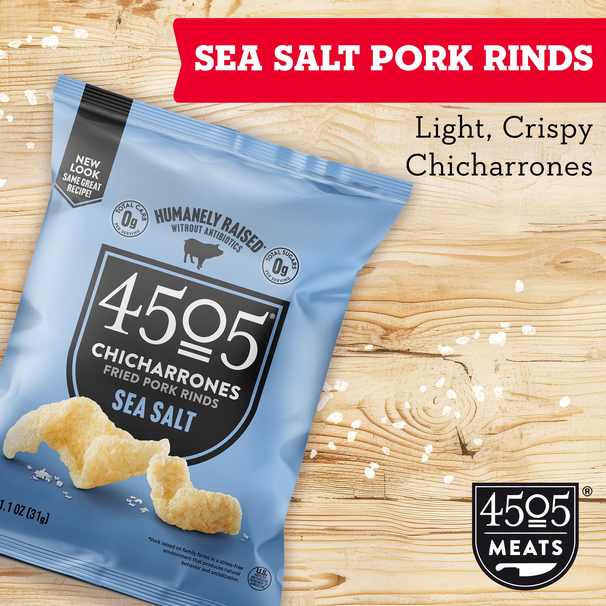 4505 Sea Salt Chicharrones on a charcuterie board pairing with cheese and nuts.