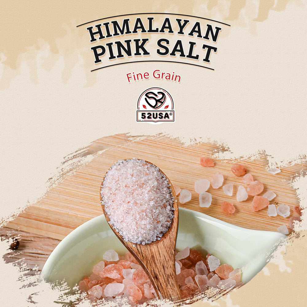 52USA Himalayan pink salt fine grain being dispensed for seasoning