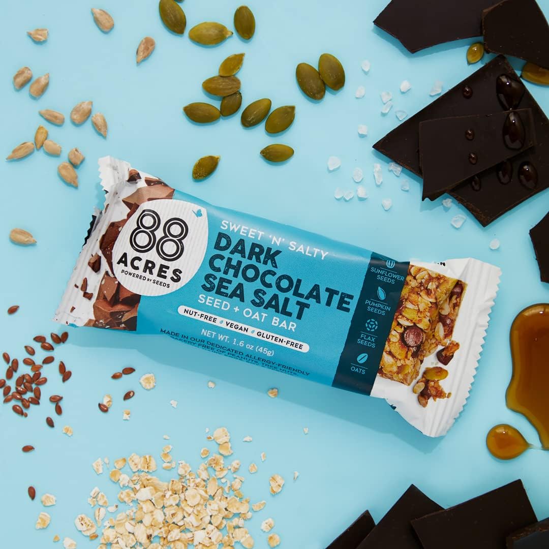 Vegan and non-GMO label on 88 Acres Granola Bar reinforces clean ingredients.