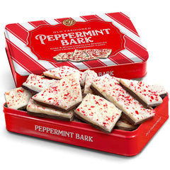 A Gift Inside CY Chocolates peppermint bark tin with dark and white layers, ideal holiday gift.