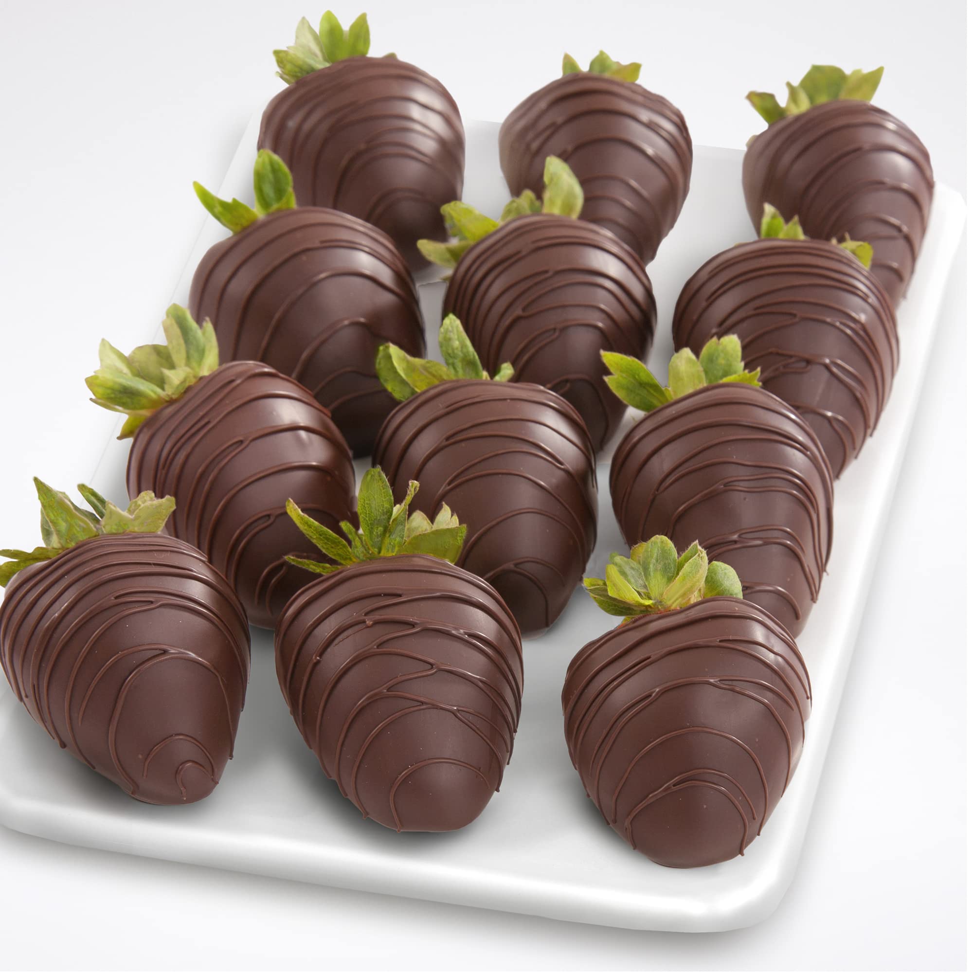 A Gift Inside dark chocolate coated strawberries close-up, showcasing decadent flavor and premium quality.