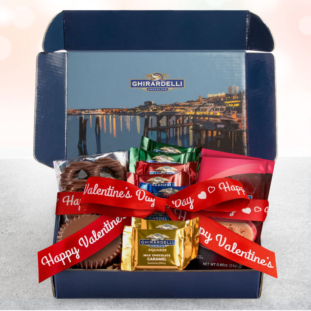 Valentine ribbon on Ghirardelli box enhances festive gifting presentation.