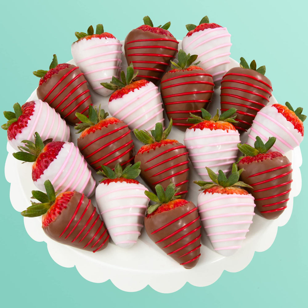 A Gift Inside Love Bites chocolate-dipped berries showcasing dark, milk, and white coatings.