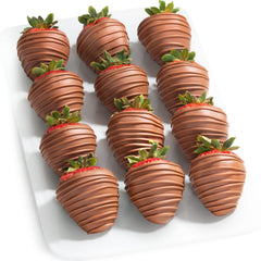 A Gift Inside Milk Madness strawberries dipped in milk chocolate for a decadent gift.