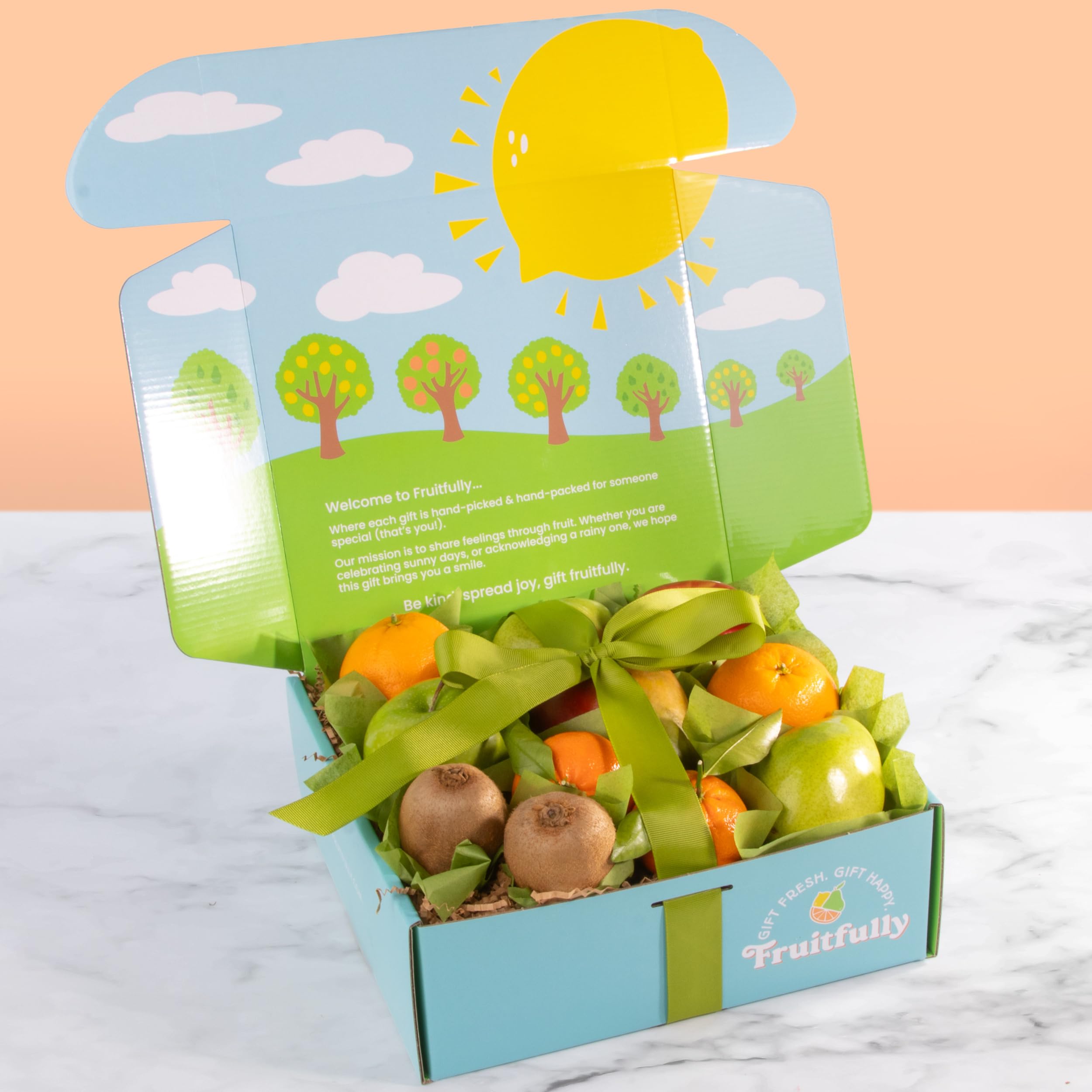 A Gift Inside Navel Oranges and Apples, bright mixed fruit display.