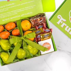 A Gift Inside satsuma mandarins and navel oranges image, ideal for seasonal gifting.