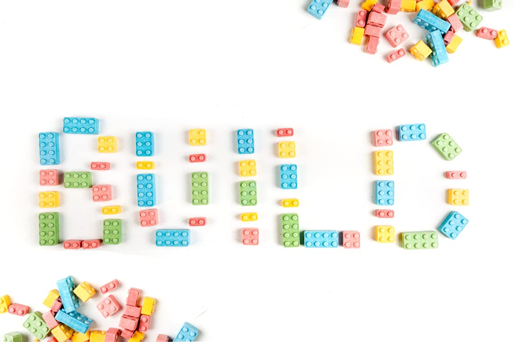 Party idea with edible building blocks to create interactive decor and fun treats.