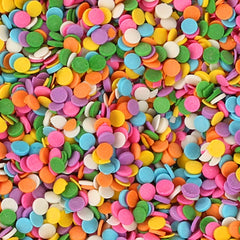 A Great Surprise confetti jimmies brighten cakes and cookies with pastel charm.