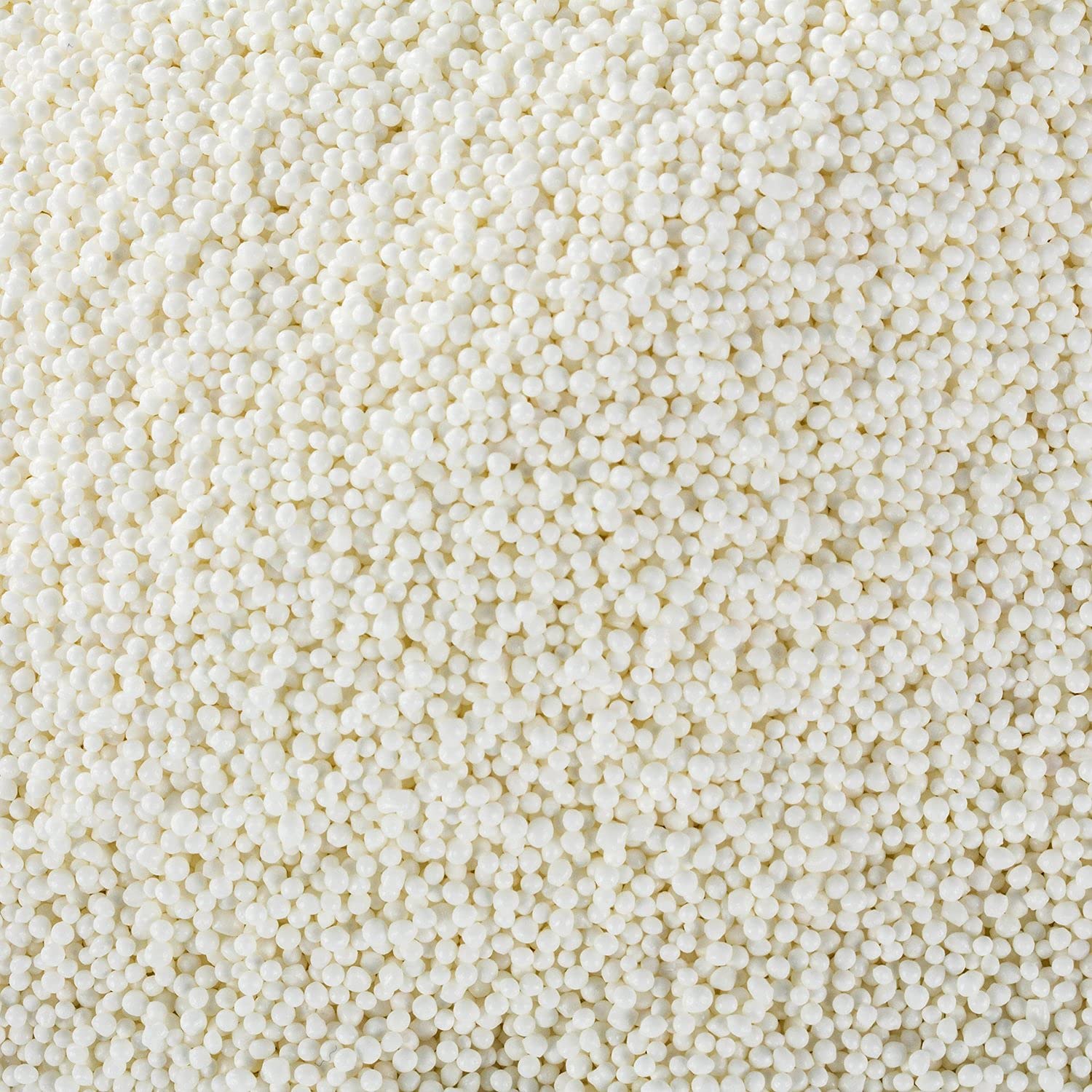 A Great Surprise cupcakes with white nonpareils for festive decoration