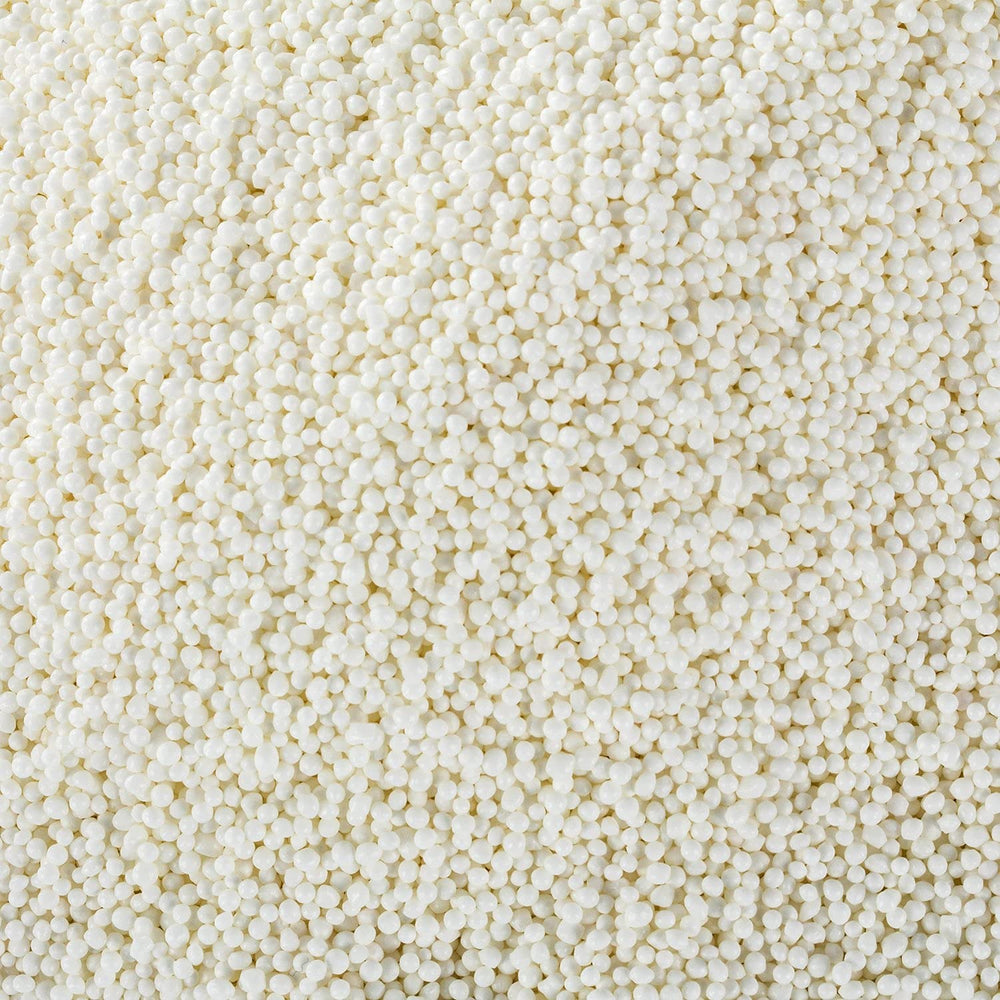 A Great Surprise cupcakes with white nonpareils for festive decoration