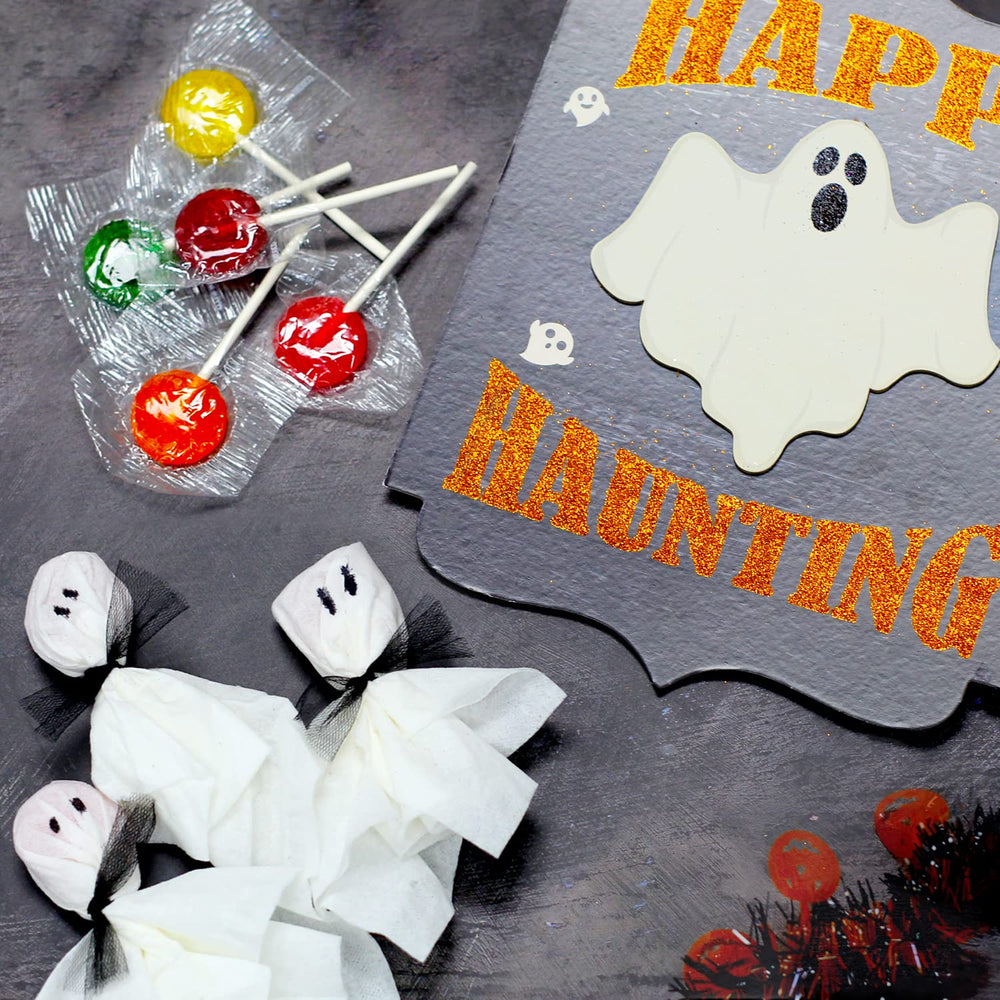 A Great Surprise color-pop lollipops catch eyes at candy buffets.