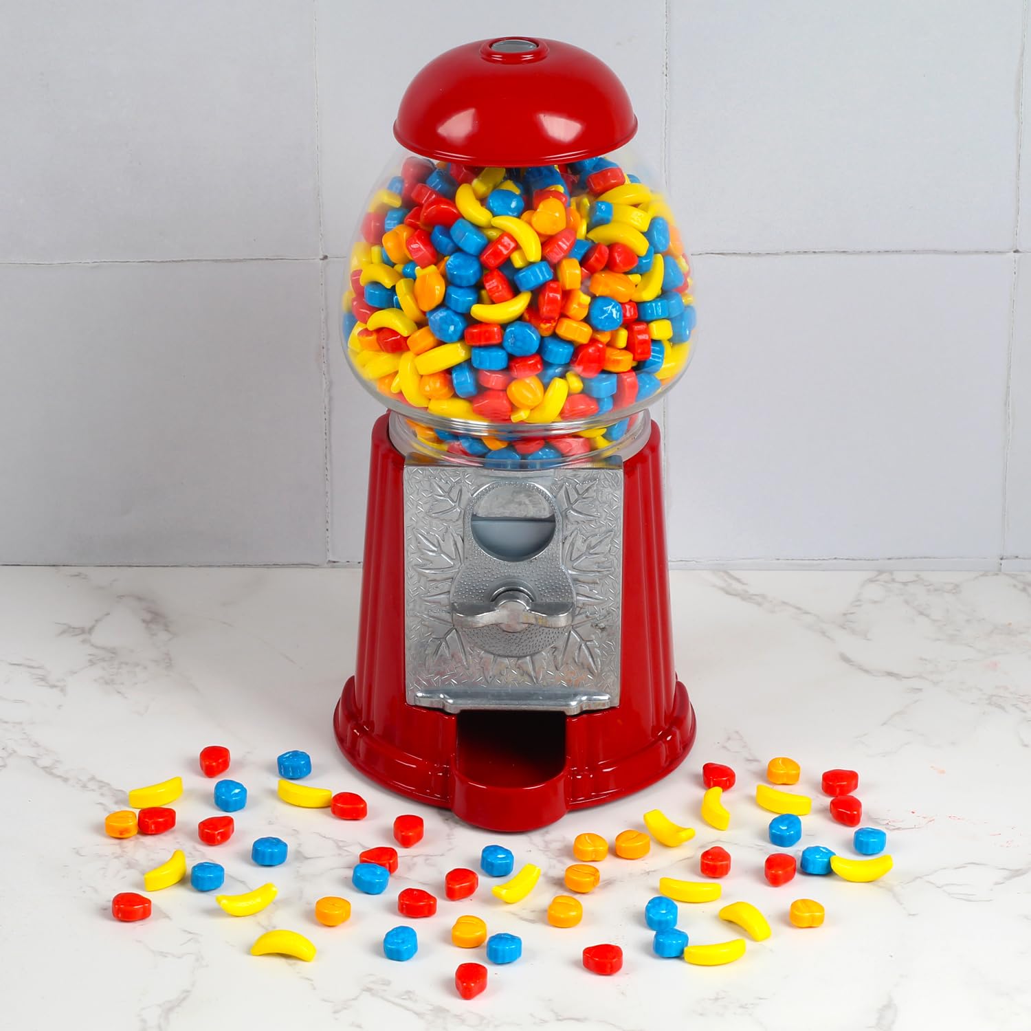 A Great Surprise party favors display with colorful fruit candies.