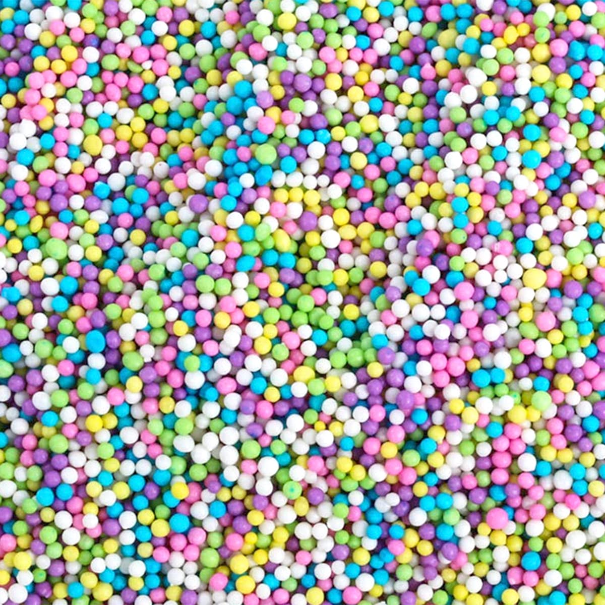 A Great Surprise rainbow nonpareils on ice cream add playful color and texture.