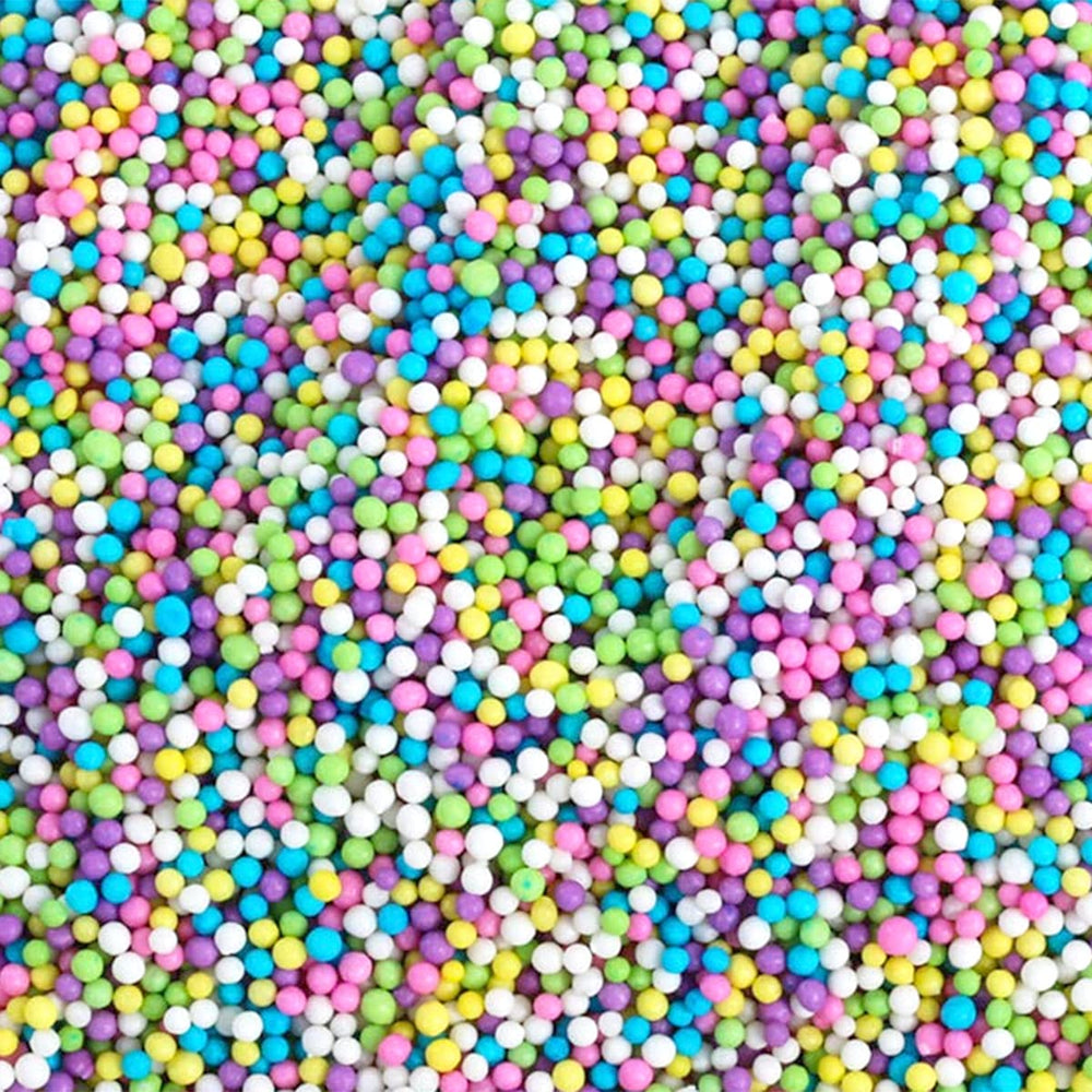 A Great Surprise rainbow nonpareils on ice cream add playful color and texture.