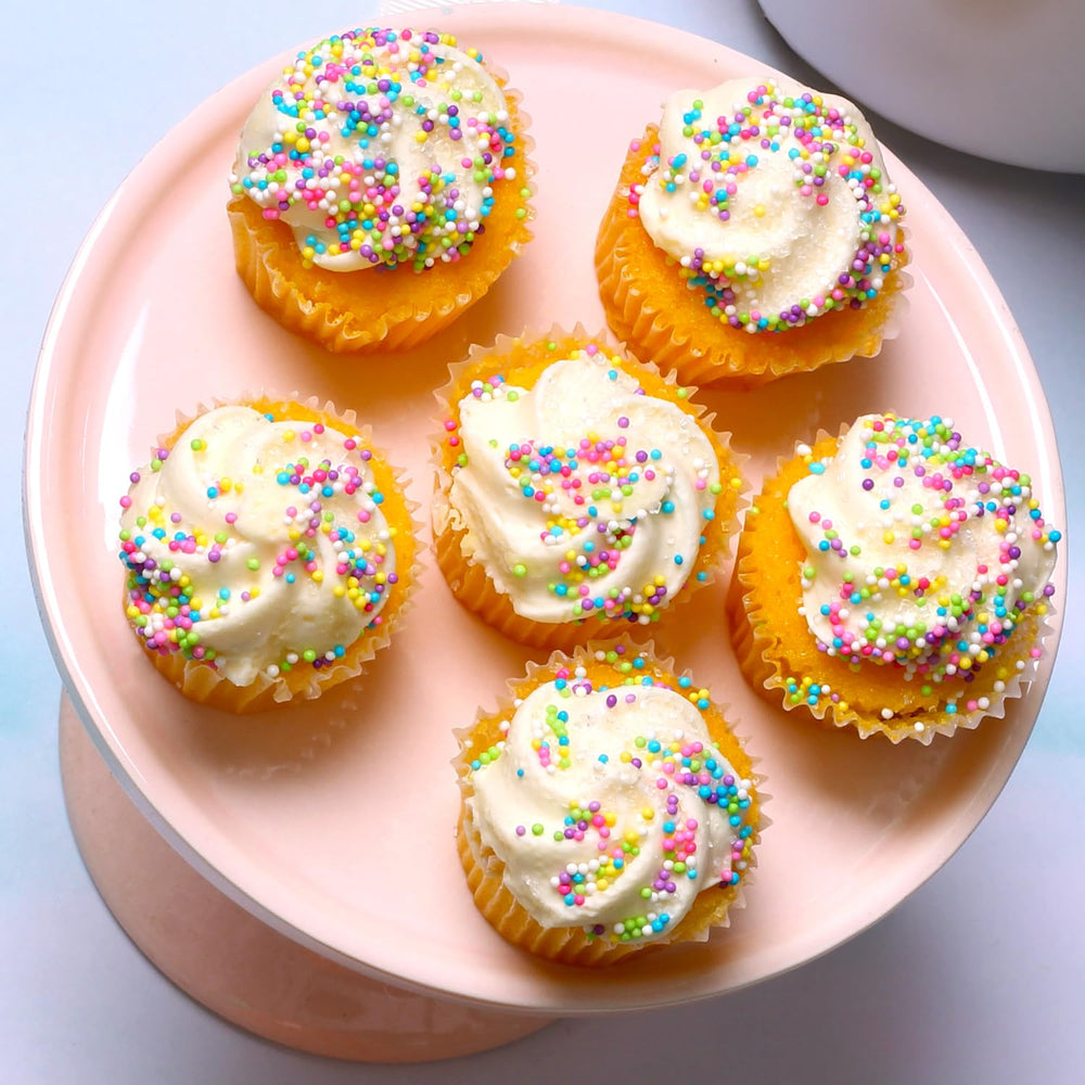 A Great Surprise sprinkles on cookies and cupcakes for festive flair.
