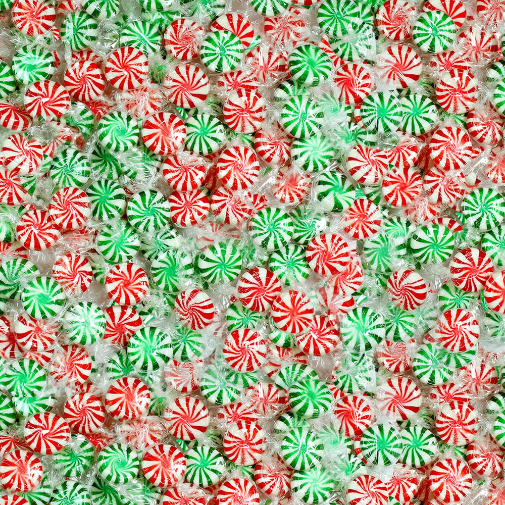 A Great Surprise Starlight Mint candies with red-white-green swirls ideal for festive bowls.