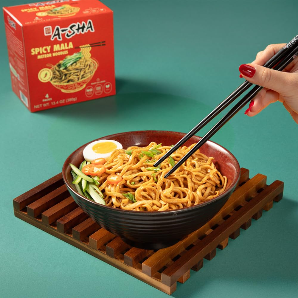 A-Sha Spicy Dan Dan sauce poured over noodles for bold flavor