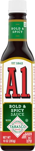 Pouring A.1 Tabasco sauce on wings for zing