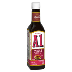 A1 Thick and Hearty Steak Sauce pours to drizzle over grilled steak.